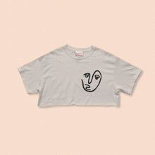 Load image into Gallery viewer, white short sleeve crop t-shirt with the face print in black