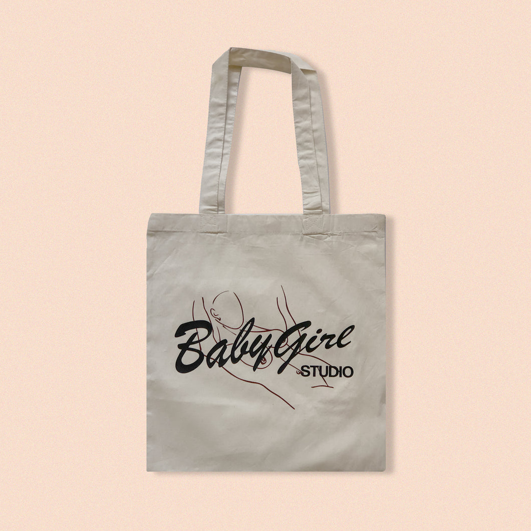 baby girl studio tote bag