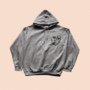 grey hoody with the face print in black